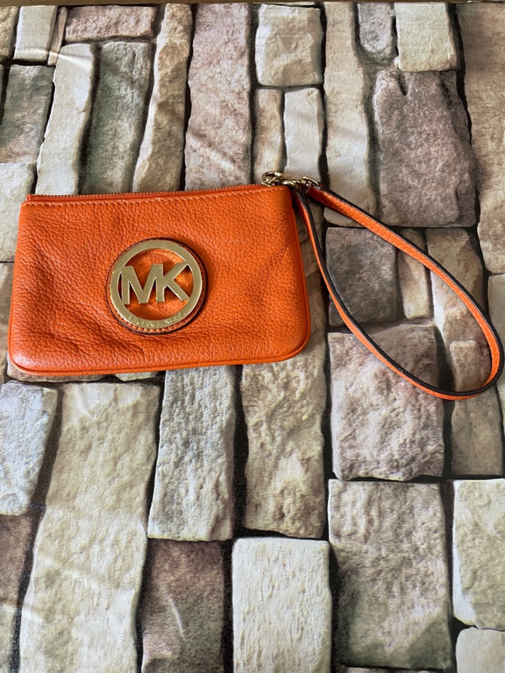 Michael Kors Orange Pebbled Leather Wristlet with Gold MK Logo